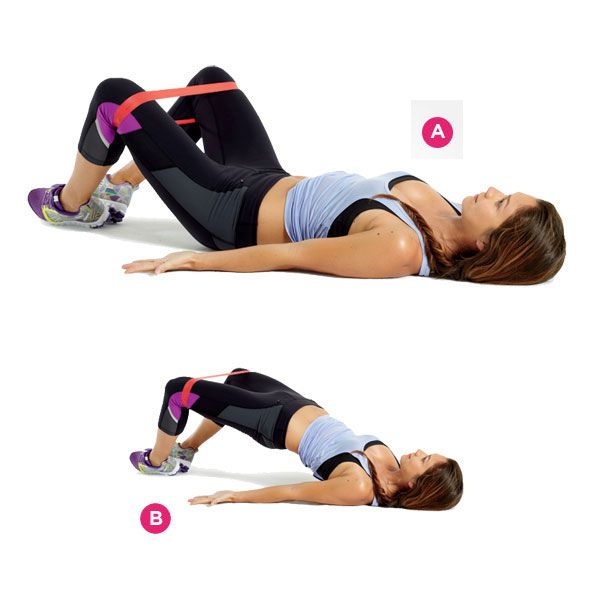 Woman demonstrating a glute bridge using a resistance band