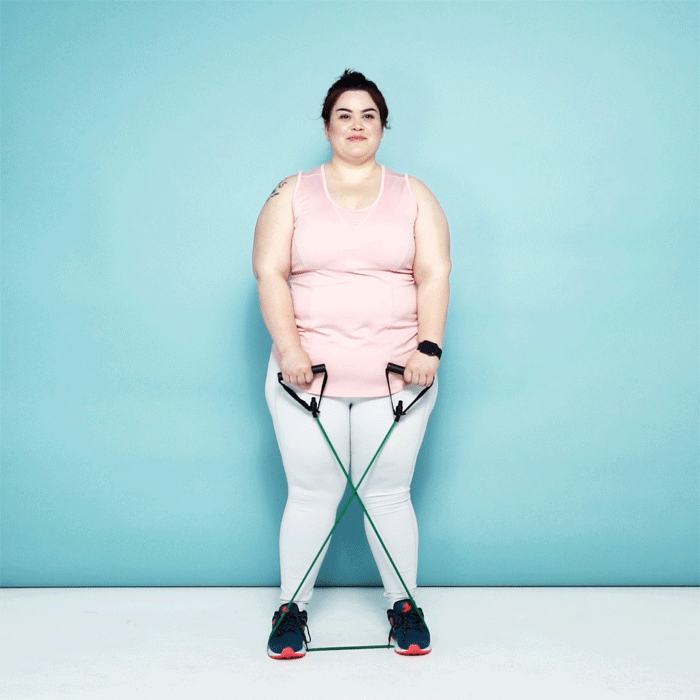 Woman demonstrating an upright row 